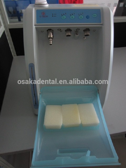 Système de lubrification de pièce à main dentaire Système d'huile de maintenance de pièce à main dentaire